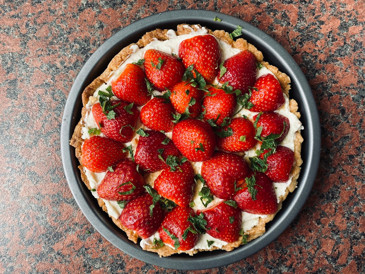 strawberries on white ceramic bowl