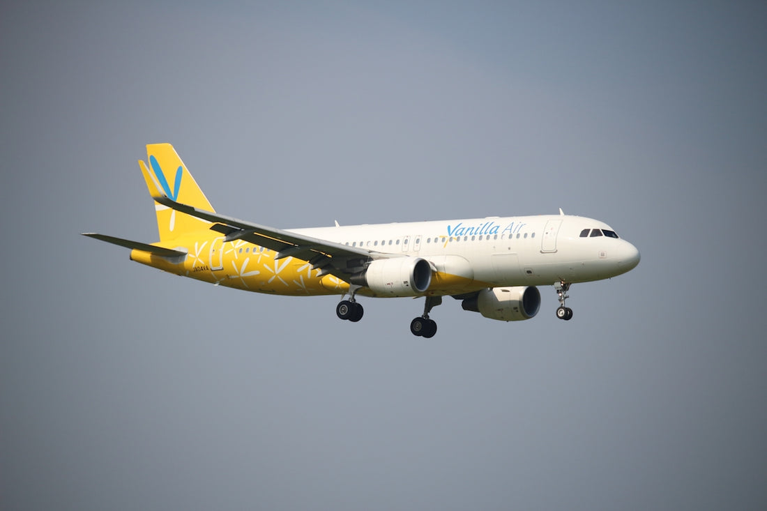 a large airplane flying in the sky