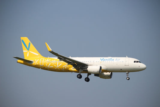 a large airplane flying in the sky