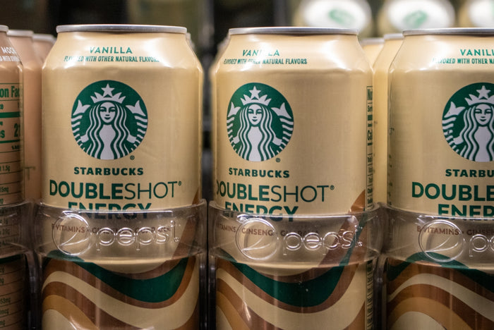 Starbucks doubleshot energy vanilla cans are stacked.