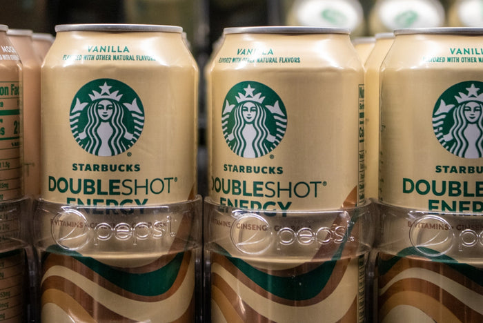 Starbucks doubleshot energy vanilla cans are stacked.